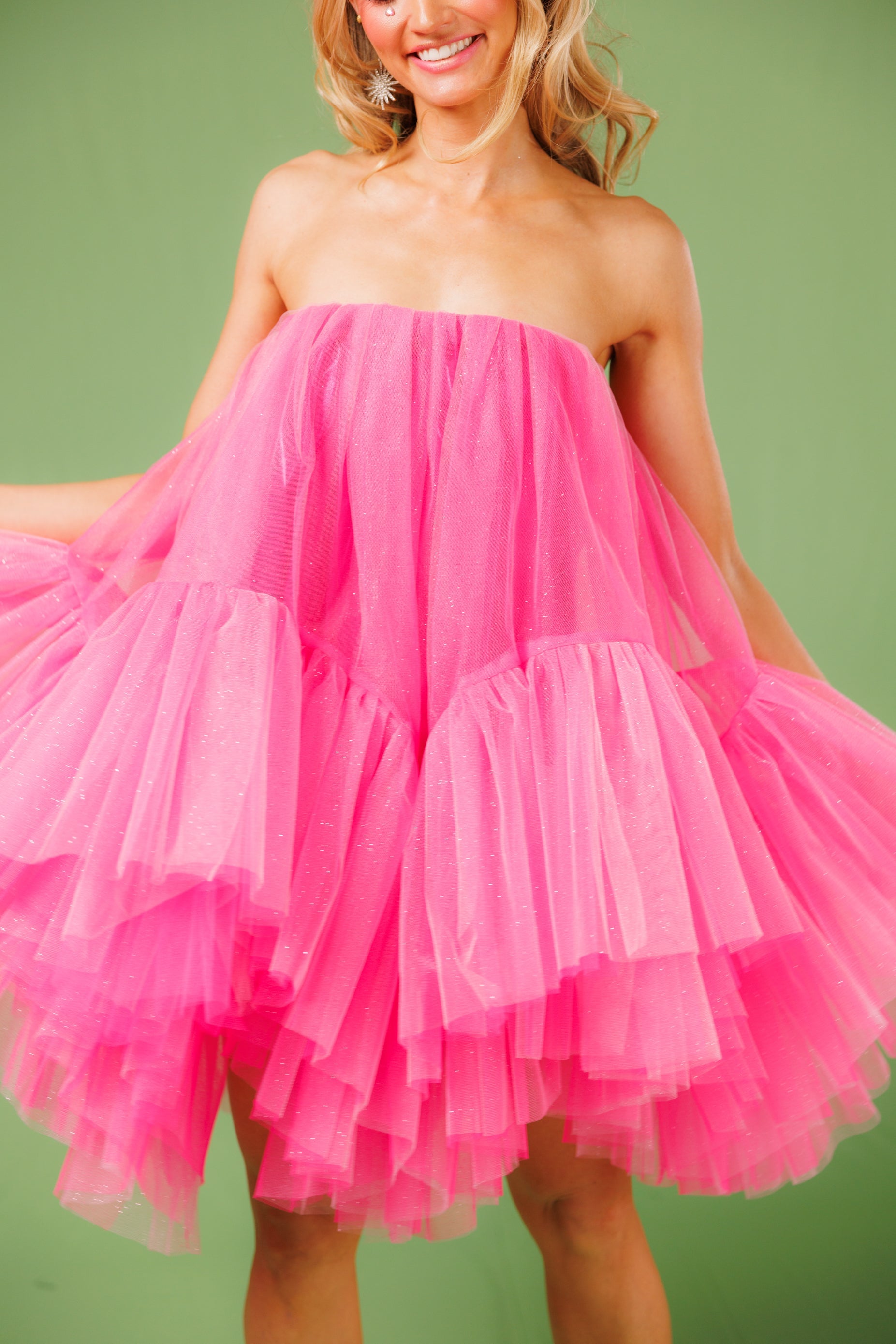 close up view puffy pink glitter tulle dress